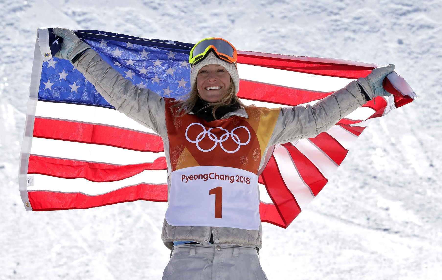 Jamie Anderson celebrates winning gold after the women's slopestyle final